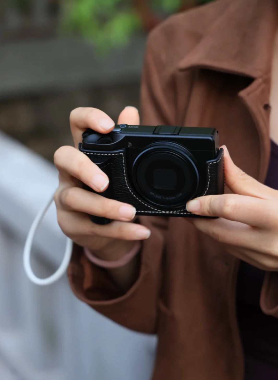 Compact camera in use