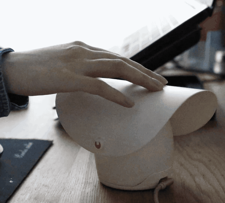 Opening the hat to switch listening modes